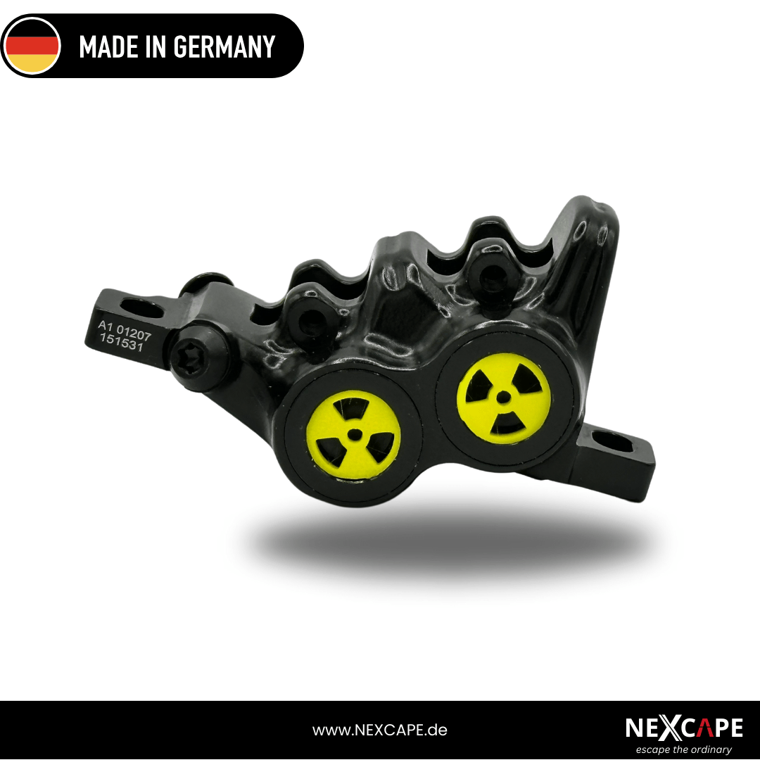 NEXCAPE Bremssattel-Blende Set in Gelb mit Radioaktiv-Motiv am Magura MT5/MT6/MT7 Trail Bremssattel – MTB- & E-Bike-Tuning, Made in Germany