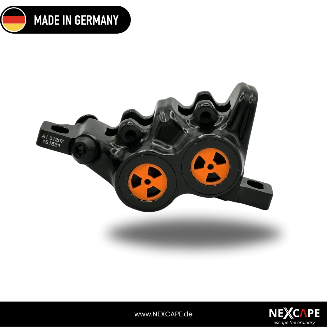 NEXCAPE Bremssattel-Blende Set in Rot mit Radioaktiv-Motiv am Magura MT5/MT6/MT7 Trail Bremssattel – MTB- & E-Bike-Tuning, Made in Germany